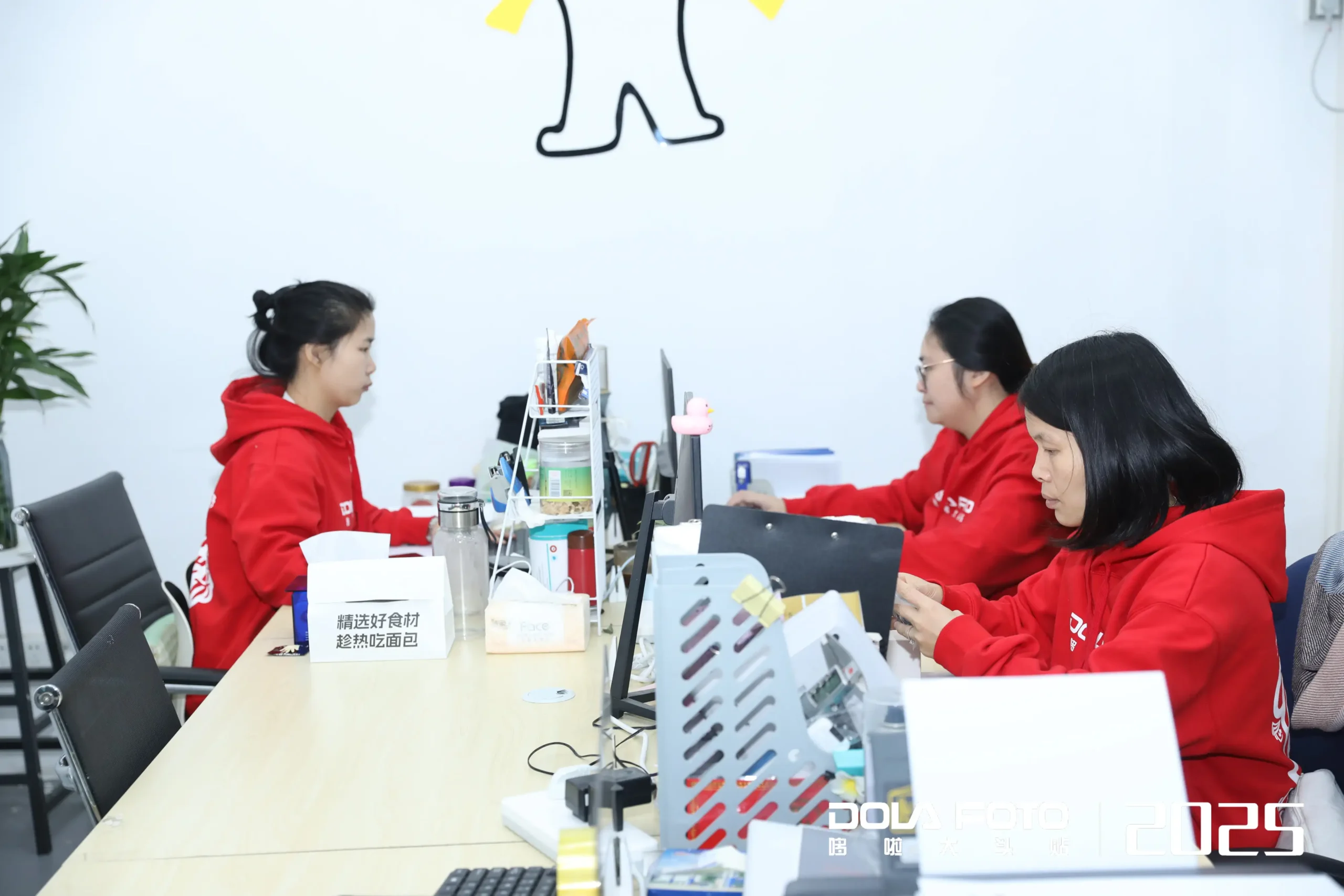 Product Testing Lab Engineers Conducting Device Trials With DOLA FOTO B2B Enterprise Photo Booth Technology For Comprehensive Quality Control And Corporate Compliance