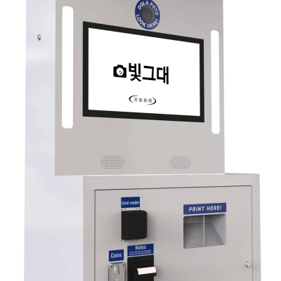 DOLA FOTO Dual Printers Photo Booth Left Side Profile Display Featuring Paper Roll Access Panel And Branding Graphics For Enterprise Photo Booth Solutions